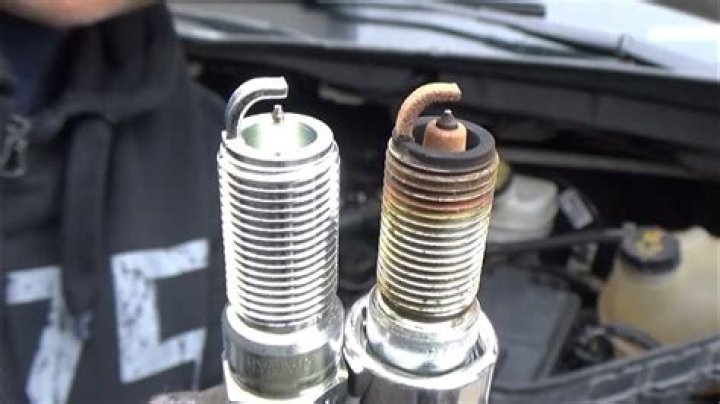 Can a loose spark plug make a ticking sound?