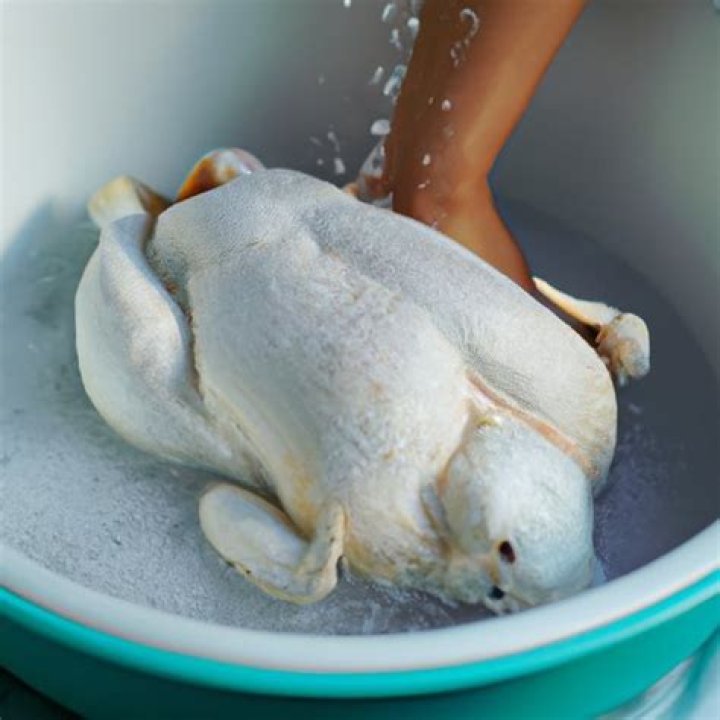 Do you wash chicken with hot or cold water?
