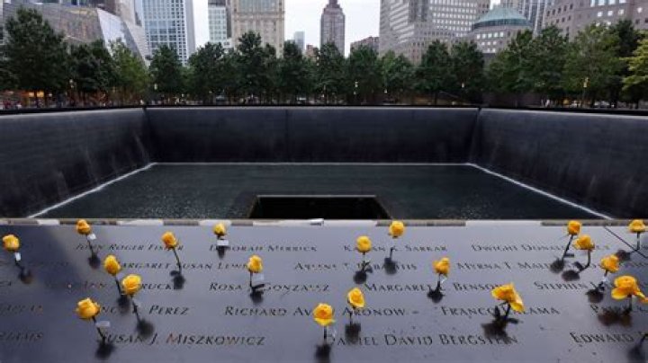 How deep is the middle of the 9/11 Memorial?