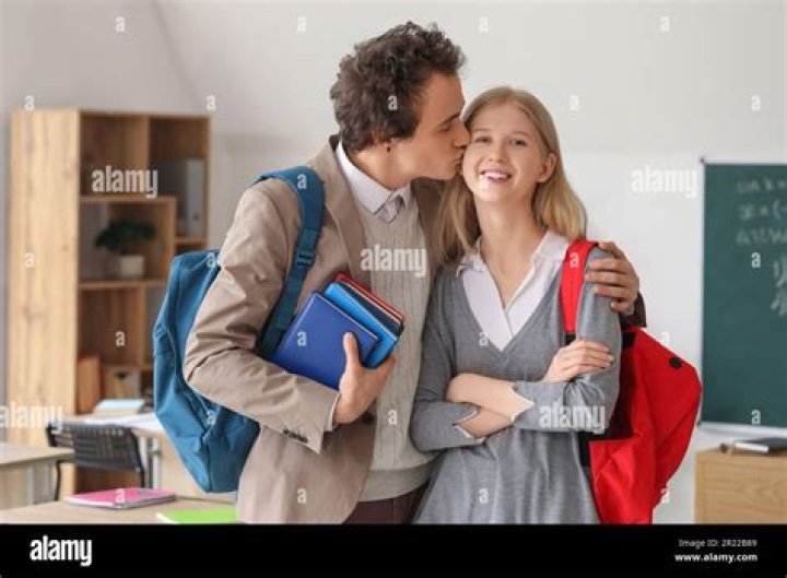 How do I kiss my girlfriend at school?