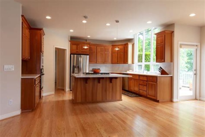 Is it cheaper to refinish cabinets or buy new?