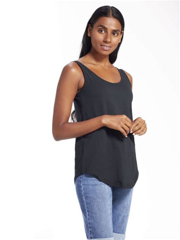 Should a vest be tight or loose?