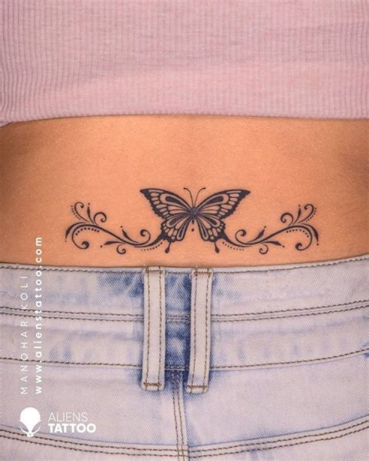 What does a butterfly tattoo on lower back mean?