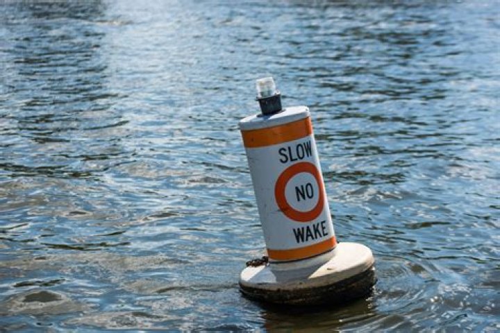 What does a white buoy with an orange square mean?
