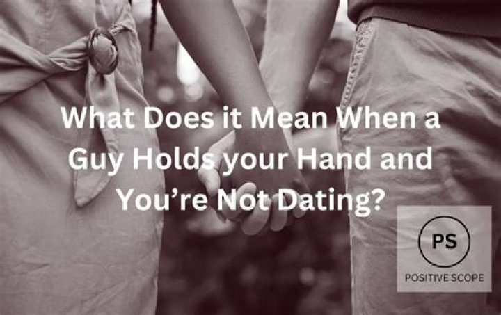 What does it mean if a guy holds your hand tightly?